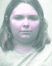 Adoptive mom faces abusers, says girl is overcoming abuse