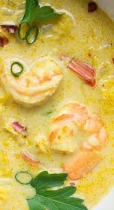 Thai Coconut Shrimp Soup This Soup With Flavors Of Creamy Coconut Spicy Red Chilis And A Bit Of Curry Finds Balance Soup Recipes Recipes Thai Coconut Soup