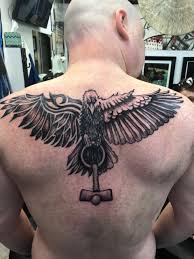 Geometric raven side body tattoo. Ace Tattoo Piercing Tribal Raven Tattoo By Randy Culver Facebook