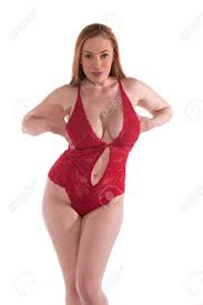 Curvy Young Redhead In A Red Lace Bodysuit Stock Photo, Picture and Royalty  Free Image. Image 80766887.