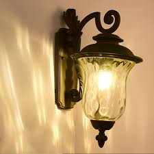 This mediterranean style outdoor wall light comes in a warm bronze finish and champagne hammered glass. Waterproof Outdoor Wall Light