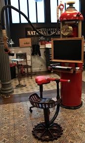 Steampunk Back Tattoo To The Future By Bruce Rosenbaum And Ken Taylor A 1918 Gas Pump Gets Converted In Tattoo Studio Tattoo Studio Interior Studio Interior