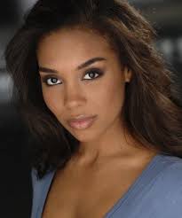 Celestine Rae as Camille Bishop.