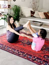 6 yoga moves you can do with your kids partner yoga poses partner yoga yoga for kids
