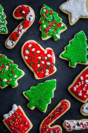 Plate with christmas gingerbread cookies decorated with wreath made of rosemary on white table. Easy Sugar Cookies Recipe Natashaskitchen Com