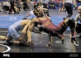 Arizona States Anthony Robles, right, escapes from a hold by Columbias  Brandon Kinney in the 125 lb. class, in the first round of the NCAA  Wrestling championships, Thursday, March 20, 2008, in