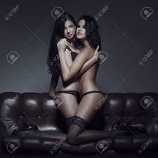 Sexy Lesbian Couple Foreplay On Sofa At Night, Kneeling Royalty Free Stok  Fotoğraf, Resimler, Görseller ve Stok Fotoğrafçılık. Image 24735806