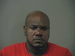 Felon passed out in car allegedly possessed loaded gun