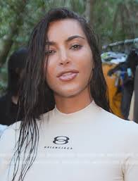 Kim Kardashian White T Shirt WornOnTV: Kim's White Balenciaga Logo Tee On  The Kardashians Kim