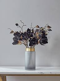 Sourcing the most realistic fake wedding flowers and designing quality silk flower bouquets has become my life's great joy! Six Deep Burgundy Magnolia Stems