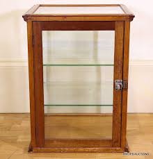 Glazing kitchen cabinets is a budget friendly way to give a kitchen an instant makeover. A Small Vintage Glazed Display Cabinet Early 20th Century The Furniture Oriental