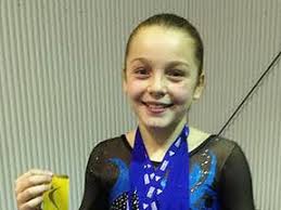 Local gymnasts win gold