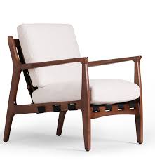 Belted Straps Add Support Along The Bottom And Back Of This Unique Chair Finished With Soft Leather Cushions The Kenneth C Living Room Chairs Chair Furniture