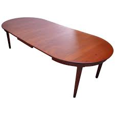 Dining tables are multifunctional spaces for eating, working, socialising and playing. Danish Teak Round Extendable Dining Table By Skovmand Andersen Jarontiques