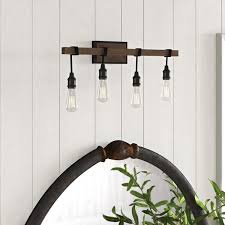 A bronze light fixture is a little bit different than the basic kind of metallic color that you might be used to. Champagne Bronze Vanity Light Wayfair