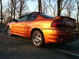 Image result for Sunburst Orange 2004 Pontiac