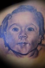 Another popular tattoos are baby angel tattoo with your own child's face, as people ink such tattoos to express love to their children. Baby Face Tattoo From Photo Tattooimages Biz