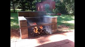 Choose a site for your bbq that's relatively flat, protected from the wind, away from shrubs and bushes and not too far from your kitchen. Build Your Own Backyard Concrete Block Grill Easy Youtube