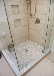 Frameless Shower Highlights Beautiful Tile Work Marble Base Is Classic Bathroom Flooring Shower Tile Wood Plank Tile