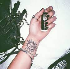 Stunning Sun And Moon Tattoo Ideas Sun Tattoos Wrist Tattoos For Women Tattoos