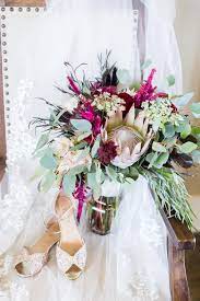 Originally located in the historic riverside area, moore flowers has since relocated to the west side of town at the corner of maple + maize. Plum And Fuchsia Bridal Bouquet Moore Flowers Wichita Ks Cheap Wedding Flowers Spring Wedding Flowers Bridal Bouquet
