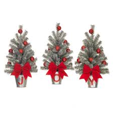Home Accents Holiday 15 In H Snowy Silver Glitter Mini Pine Trees In J O Y Buck Artificial Christmas Wreaths Christmas Ornament Wreath Holiday Decor Christmas