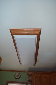 I'm excited to have you back here. Replacing The Overhead Florescent Light In The Kitchen Our Wolf Den