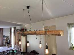 boomstam boven tafel unkl boomstam lampen houten terras