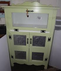 Maybe you would like to learn more about one of these? Vintage Pie Safe Storage Cabinet With Punched Tin Doors Painted Apple Green White 34 W X 16 D X 54 H Two Shelves Inside And Glass Door For Display Custom Made 25 Years Ago