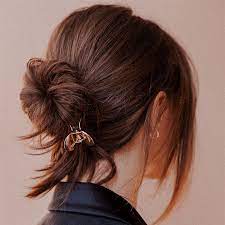 Claw Clips And Croc Clips Are Back In Trend Here S How You Can Style Em Effortlessly Daily Vanity Clip Hairstyles Thick Hair Styles Medium Hair Styles