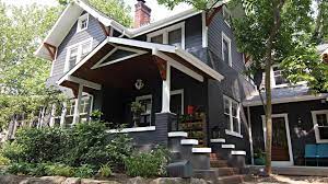 Wood accents help to soften and warm up the look in this next home. Exterior Trim Ideas Inspiration Royal Building Products