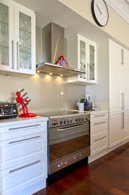 Crisp White Kitchen With Stainless Steel Appliances And Classic Clean Lines Offset By The Warmth Of Jarrah Classic Kitchens Kitchen Renovation Kitchen Interior