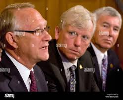 Montreal Mayor Gerald Tremblay, left, Toronto Mayor David Miller, centre,  and Kitchener Mayor and Chairman of the Big City Mayor Caucus Carl Zehr,  hold a news conference outlining their expectations from the