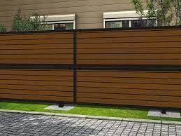 value selectのフェンス 柵 モクアルフェンス 目隠しタイプ 2段支柱 自立建て用 の商品詳細ページです 落ち着いた木目調が住まいをシックに演出します アルミフェンスの表面を木目調に仕上げた エクスショップオリジナル高級アルミフェンスです 色は黒 テラス