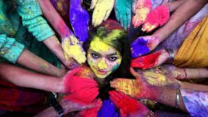 During holi, hindus attend a public bonfire, spray friends and family with colored powders and water, and generally go a bit wild in the streets. Holi Hindus Across India And Nepal Celebrate Festival Of Colours Bbc News