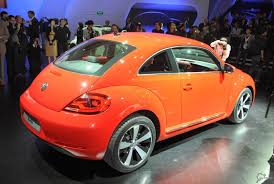 Orange Vw Beetle I Think It S A 2013 Model Vw New Beetle New Beetle Beetle
