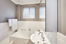 Who says you need to replace your old tiles? How To Tile Paint Renovating For Profit