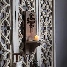 As an alternative to the first suggestion in this list, which uses birch logs standing vertically, you can cut them into the end result is a candle holder that almost mimics the look of some pieces of a birch tree that has fallen naturally. Home Decor 1piece 5 9 X 5 3 X 18 9 Wooden Crosses Wall Candle Decor Antique Brown Wooden Hanging Wall Mounted Art For Living Room Farmhouse Handmade Sconces Rustic Candle Sconces Wall Candle Holder