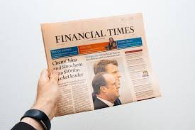 The financial times brought a higher circulation while the financial news provided much of the editorial talent. Man Holding Financial Times Newspaper With Emmanuel Macron On First Page Cover Editorial Stock Photo Image Of Financial International 92423683