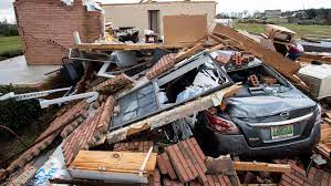 Damage to a home and downed trees are shown after severe weather in woodridge, ill., early monday morning, june 21, 2021. Al Tornado Damage Aftermath See Photos Videos Of The Storms Impacts
