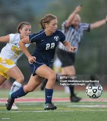 Hamburg, PAWyomissing's Jessica Ertel moves the ball past Elco's ...