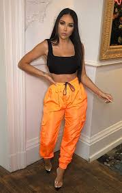 Black And Orange Cargo Pants Neon Orange Cargo Trousers Selah Neon Outfits Orange Outfit Fashion