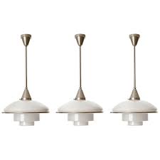 Pair art deco pendant lamps brass opal glass, circa 1935. Three Pendant Lights Otto Mueller Sistrah Nickel Opal Glass Art Deco 1931 For Sale At 1stdibs