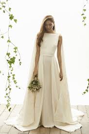 Simple Wedding Dresses With Elegance Modwedding Cape Wedding Dress Wedding Dresses Unique Wedding Dresses