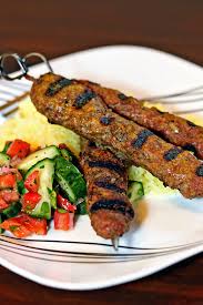 Place kabobs onto the broiler pan or cookie sheet, leaving an inch between them so the heat has room to circulate and cook the meat and vegetables evenly. Grilled Lamb And Beef Koobideh Kebabs Keviniscooking Com Kebab Recipes Beef Food Lamb Recipes