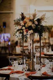 Fall Wedding Centerpiece Ideas Pillar Flowers Fall Wedding Centerpieces Rustic Flower Centerpieces Wedding Wedding Decorations Centerpieces