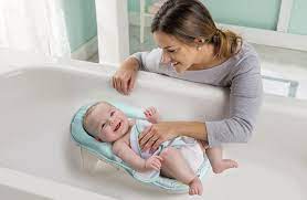 The smart sling enables you to change and choose a comfortable bathing position for your newborn baby. Summer Infant Bath Sling With Warming Wings