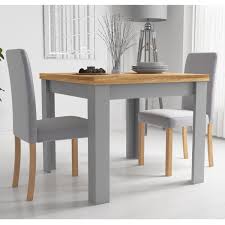 The dining chair company specialise in luxury upholstered dining chairs, available in a range of traditional and contemporary styles and handcrafted in the uk. New Town Extendable Grey Natural Dining Set With 2 Chairs In Grey Fabric Furniture123