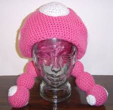 She has a long fringe that completely covers her eyes, hiding most of her face, and her mouth is notably large. Toadette Hat On Etsy 30 Creepy Costumes Hat Making Crochet Hats