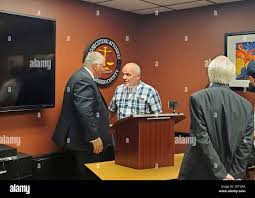 Jeff Titus speaks with Kalamazoo County Prosecutor Jeff Getting. Getting  said June 1, 2023, that he will not proceed with a new trial against Titus.  A federal judge overturned Titus' 2002 double